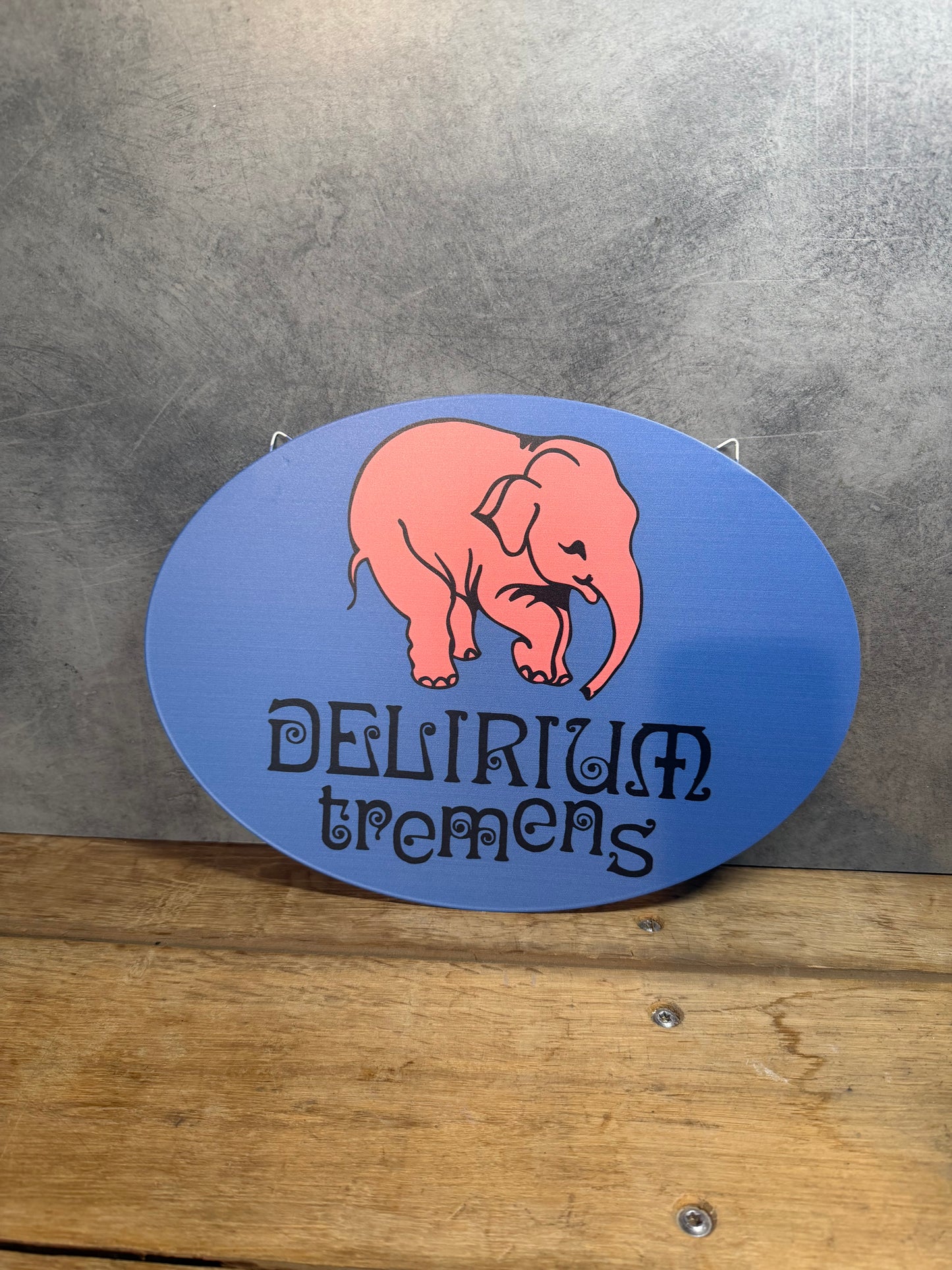 Plaque métal Logo Delirium 26x35cm